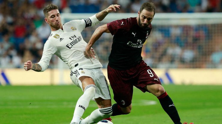 sergio-ramos-and-gonzalo-higuain-cropped_1gugae4uc8osv1vvaqn0enb347.jpg